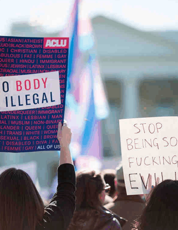 Photo of a protest sign that says, "No Body is Illegal"