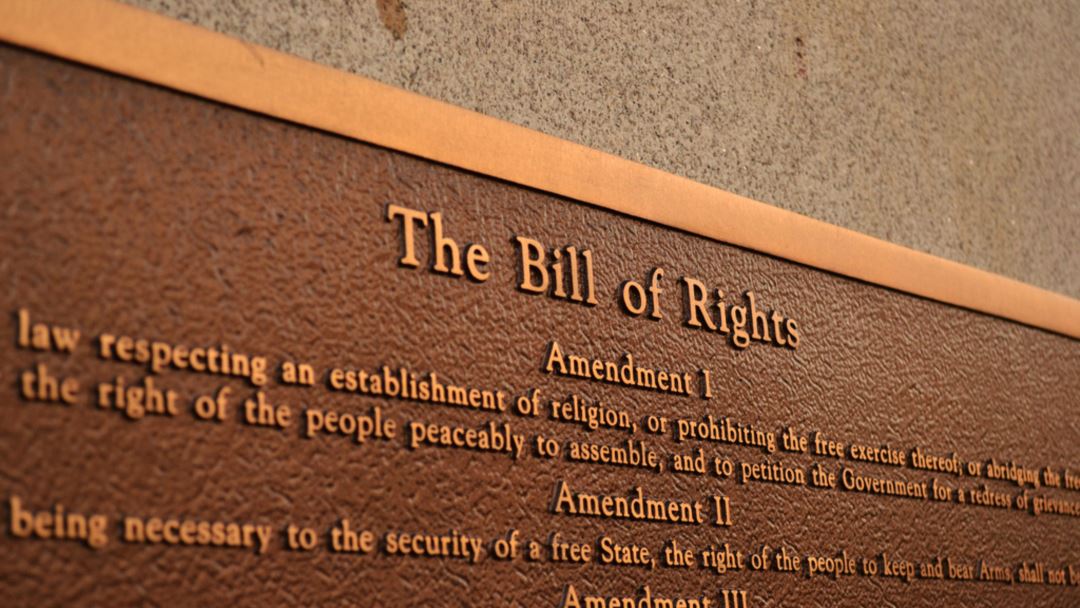 An image of a plaque featuring information from the Bill of Rights