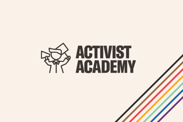 Large activist academy banner