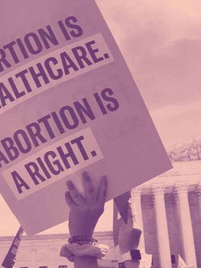 Image of a protest sign that reads, "ABORTION IS HEALTHCARE. ABORTION IS A RIGHT."