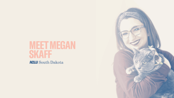 We the People Banner - Megan Skaff with their cat Topanga