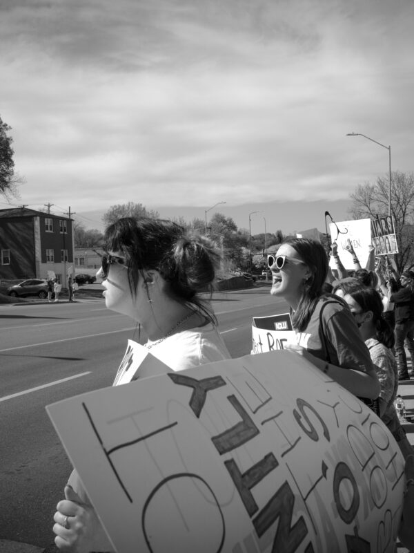 Image of a protest with a black and white filter