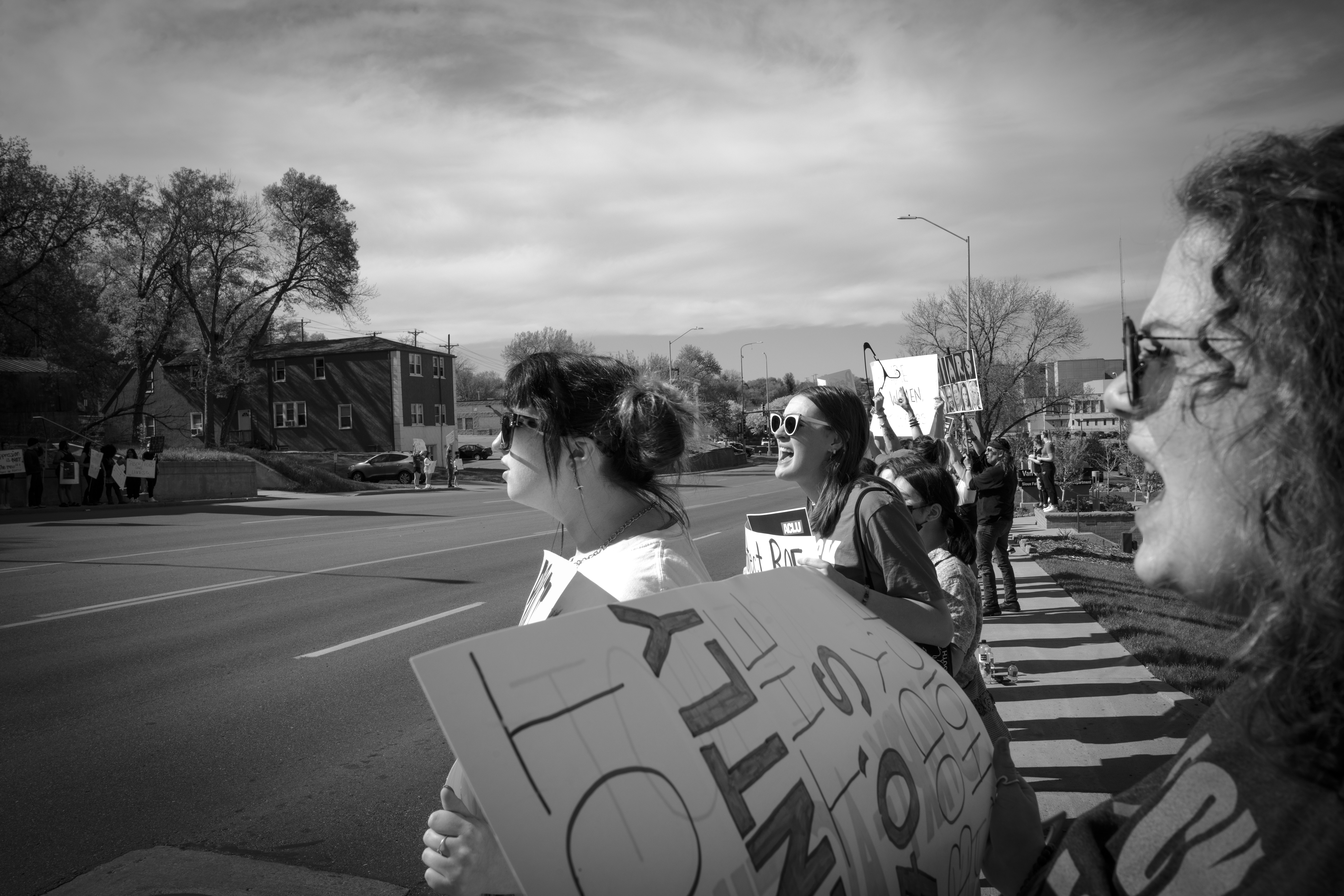 Image of a protest with a black and white filter