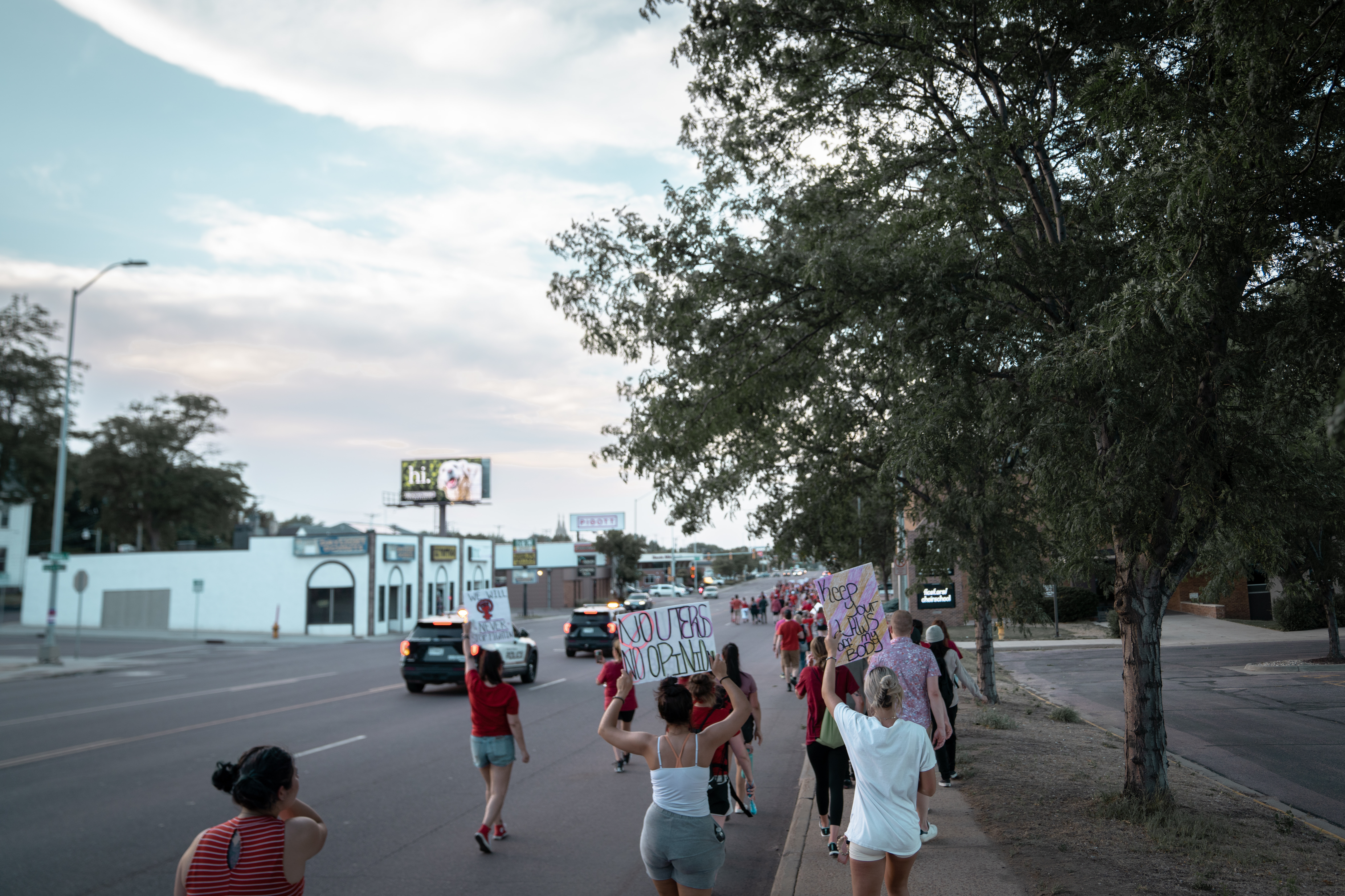image of people protesting down a street