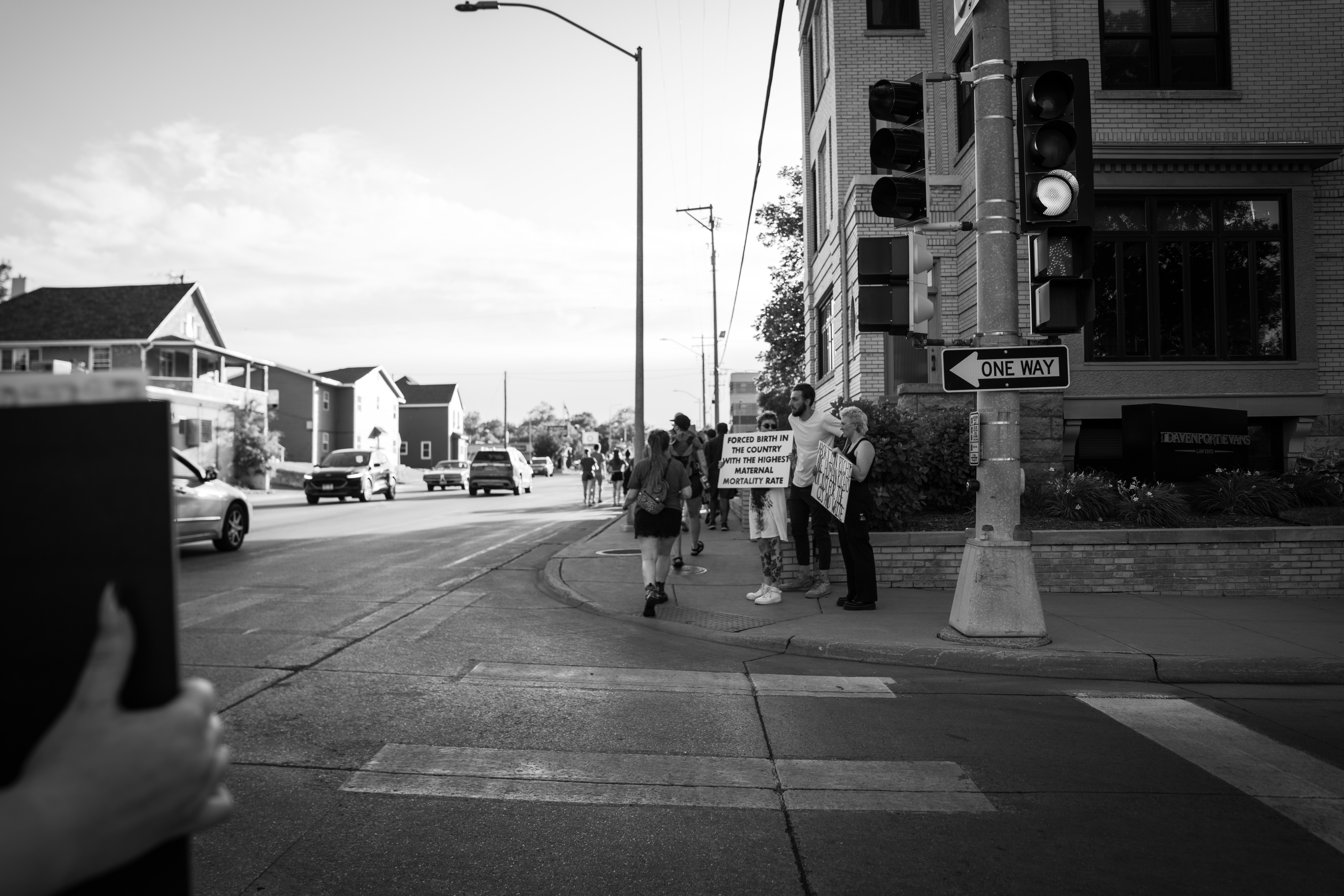 image of people protesting on a street