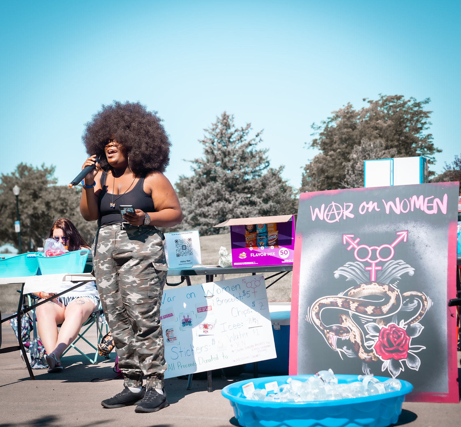 Image of a person speaking at a protest
