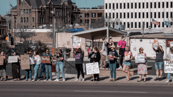 Image of protesters in downtown Sioux Falls