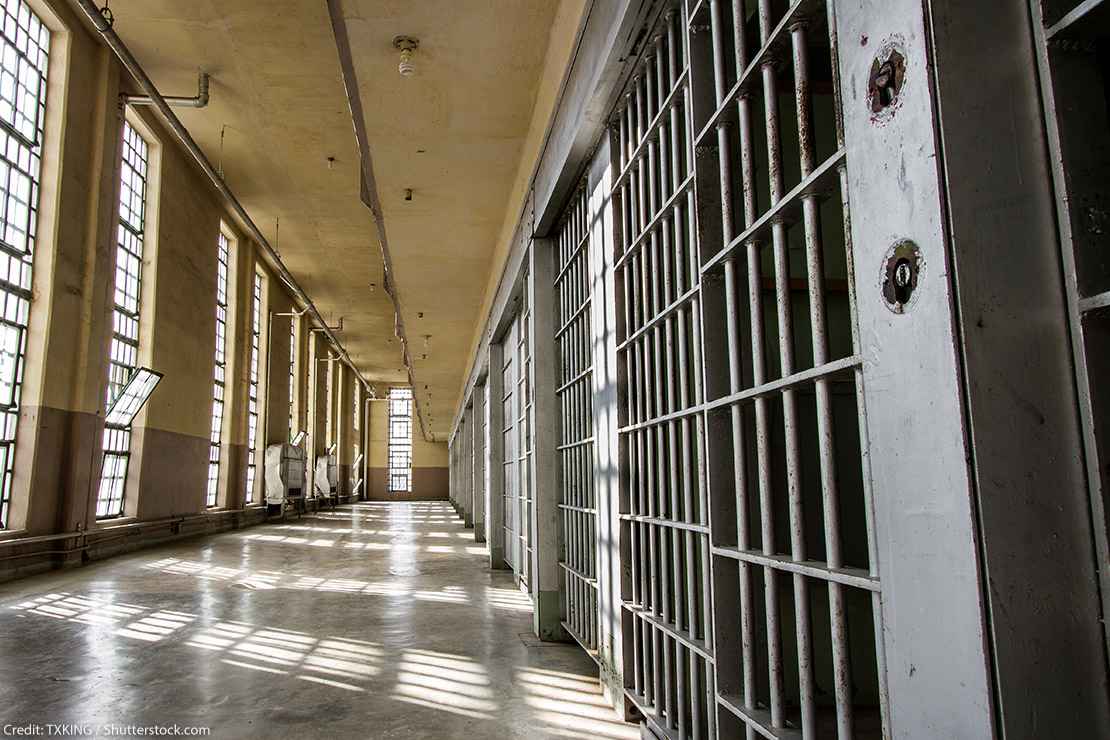 Prison cells and empty hallway