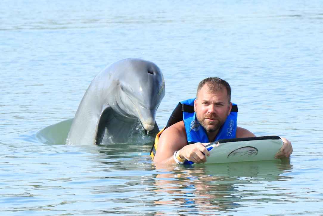 Image of Robert and a Dolphin