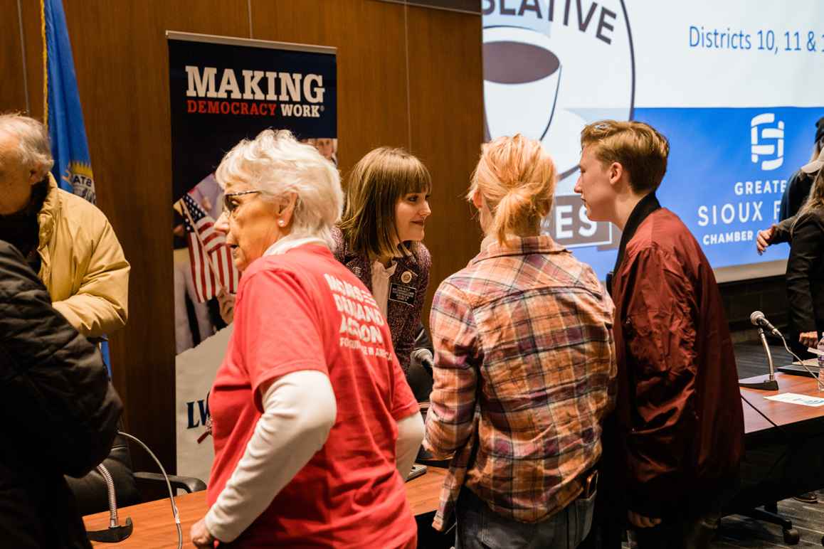 People discussing at a Legislative Coffee