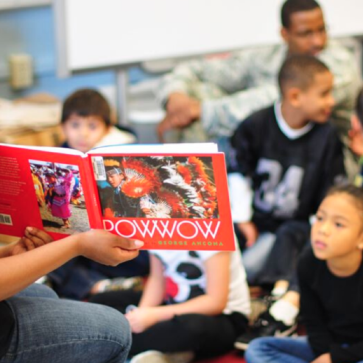 Students learning about Pow Wows